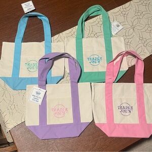 Set of 4 brand new Trader Joe’s Mini Pastel Canvas Tote Bags